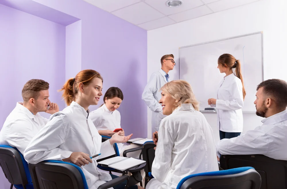 Medical students communicating between each other during recess