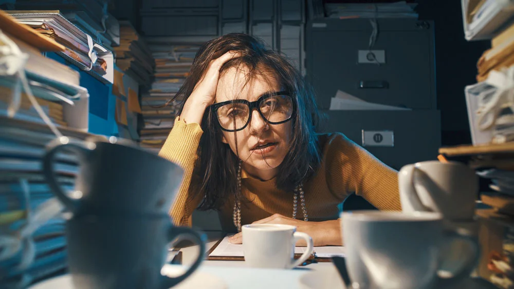 Stressed and exhausted employee
